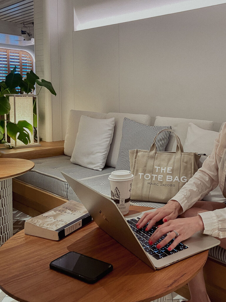 typing on laptop which is one of the task of what bloggers do