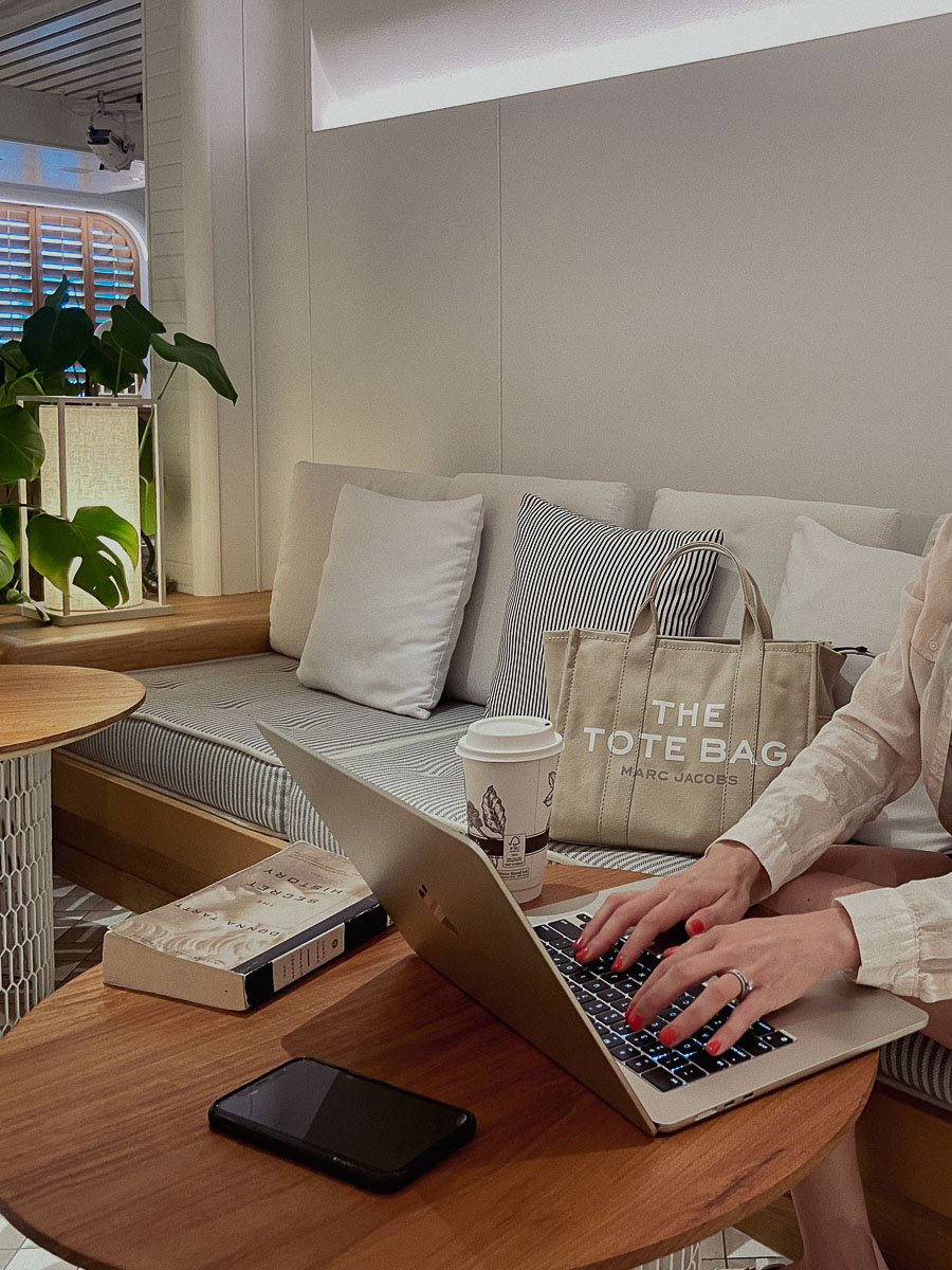 typing on laptop which is one of the task of what bloggers do