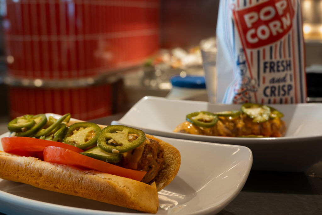 vegan hot dog and popcorn from virgin voyages the social club