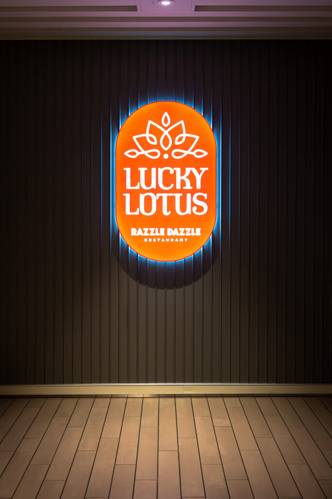 sign of a Virgin Voyages Lucky Lotus by Razzle Dazzle restaurant