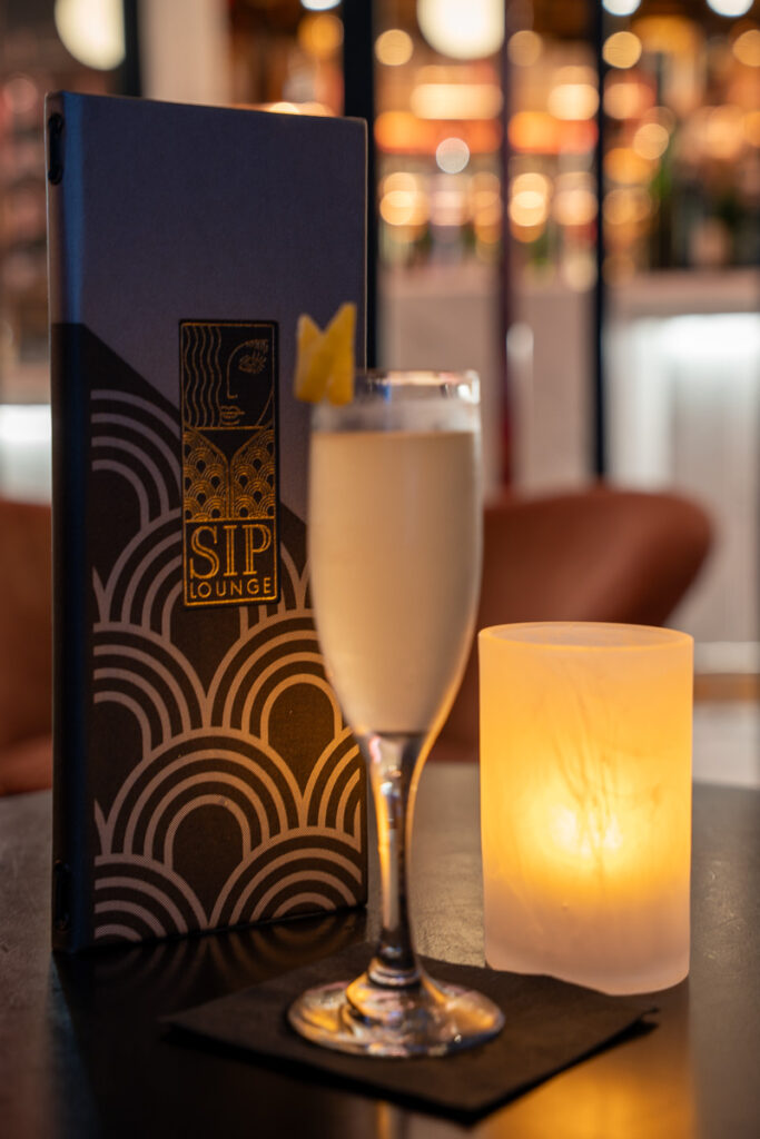 Virgin Voyages Scarlet Night Sip Champagne Lounge French 75 Cocktail