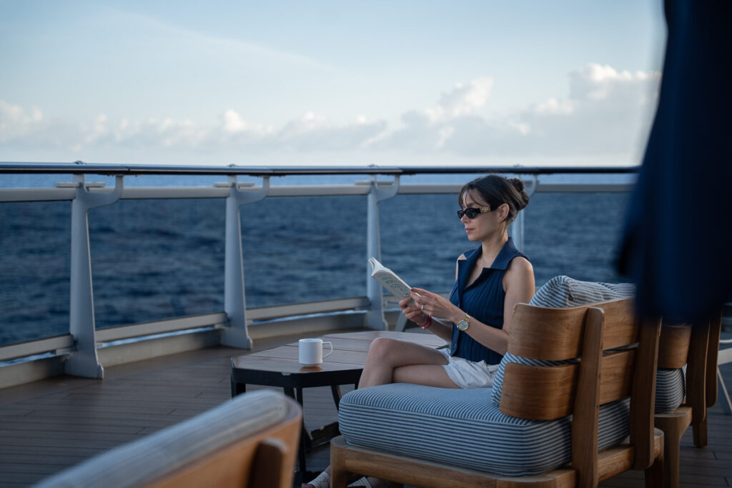 Virgin Voyages The Dock House Outdoor Reading a Book