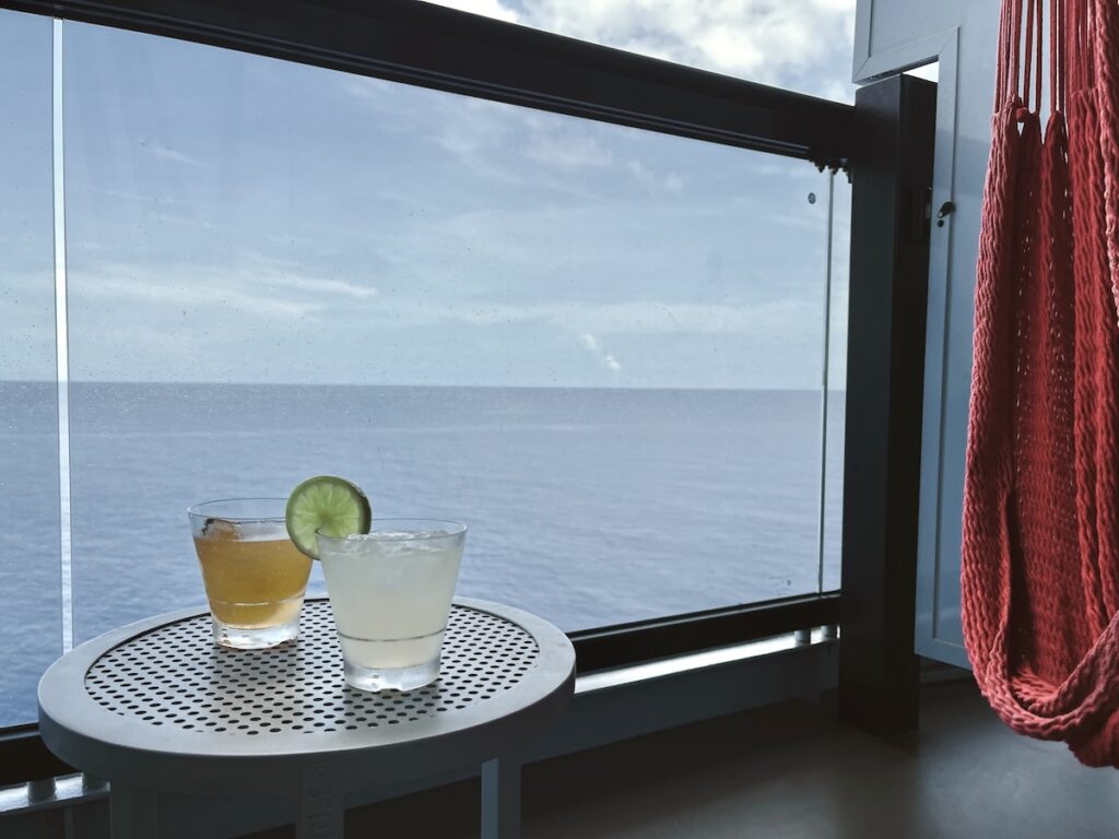 virgin voyage balcony drinks ocean view 