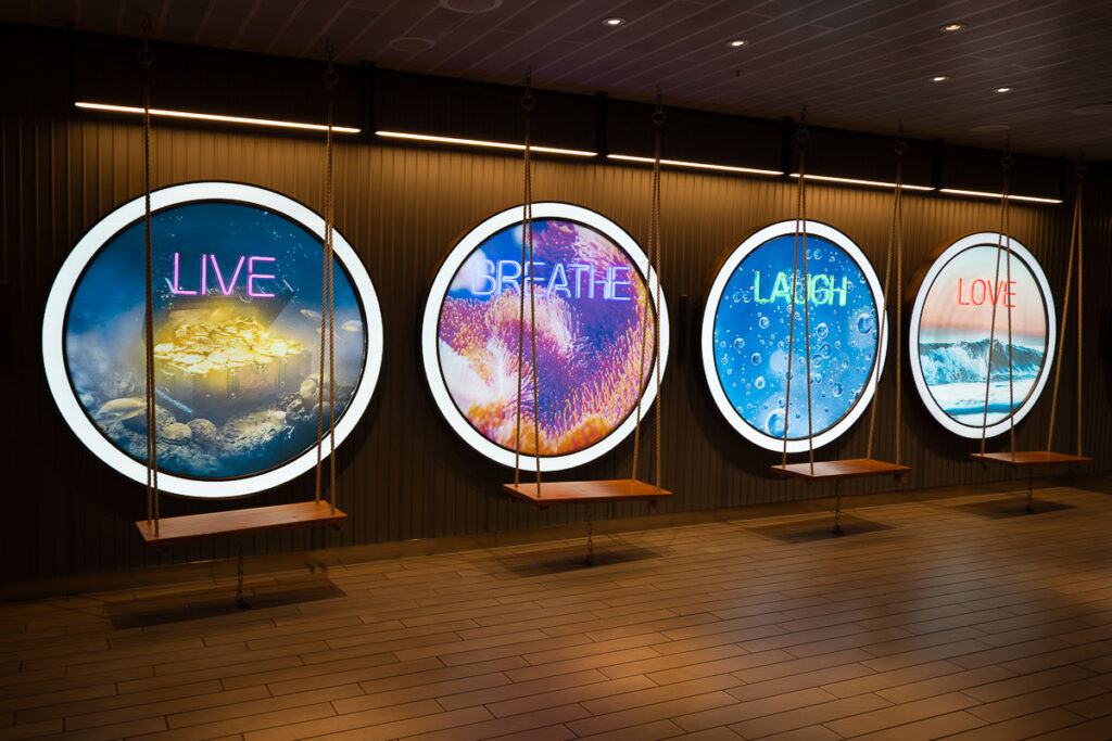 Colorful live breath laugh love swing at Scarlet Lady ship on Virgin Voyages