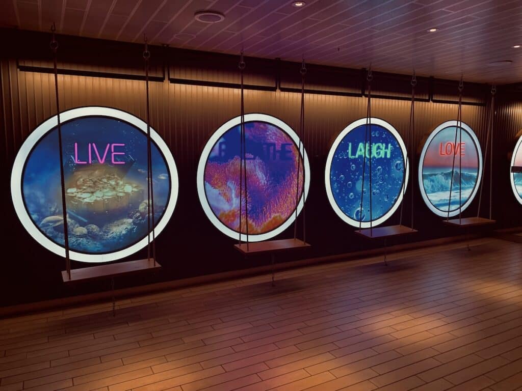 Colorful live breath laugh love swing at Scarlet Lady ship on Virgin Voyages