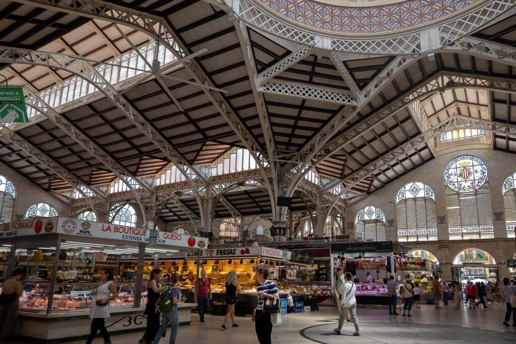 interior metal ceiling structure with different shops in the central market in valencia spain