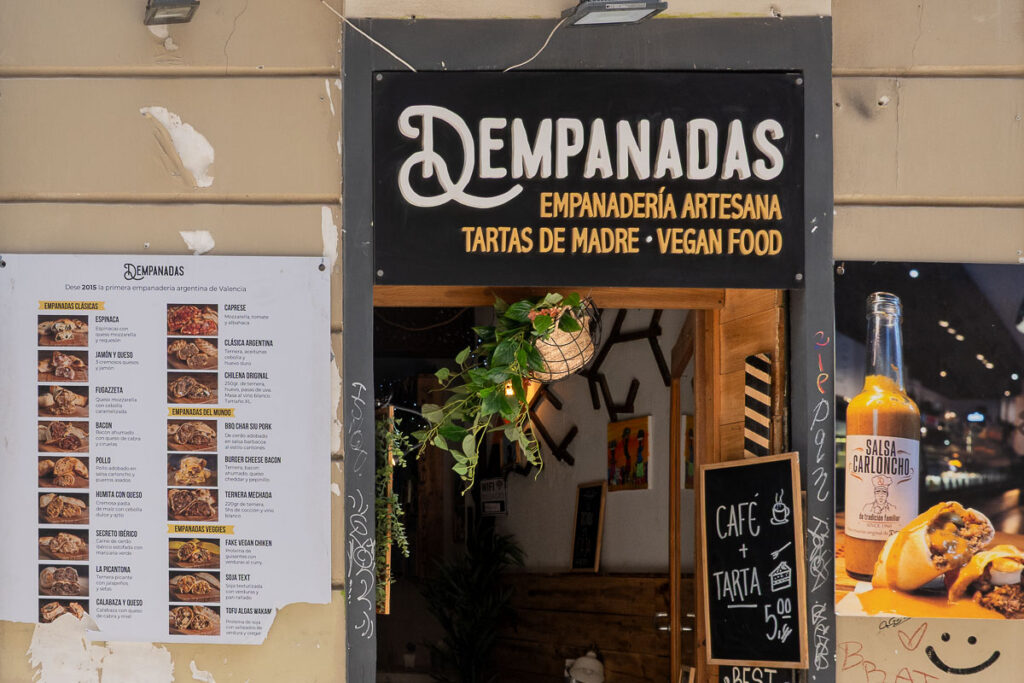 entrance of a restaurant called dempanadas