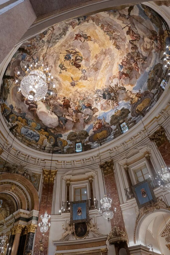 the basilica of our lady forsaken ceiling with frescos painting on the ceiling, this basilica is located in Valencia Spain