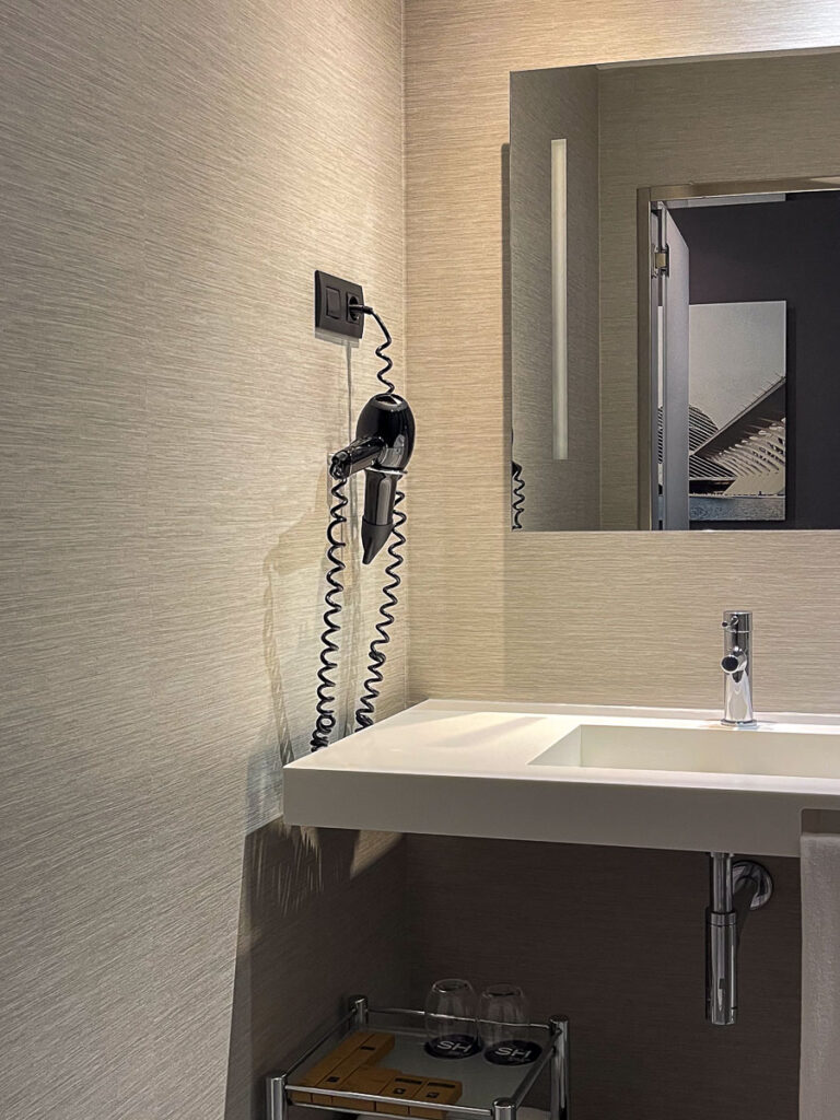 standard room bathroom sink of hotel SH Colon Valencia Spain