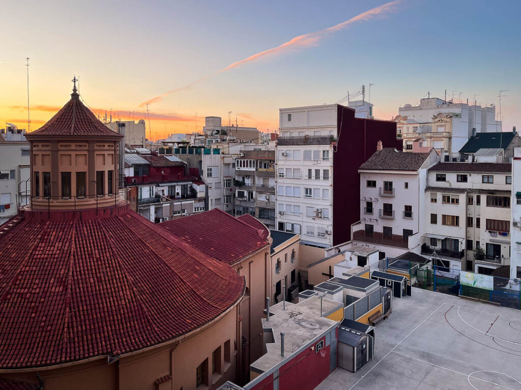 view of exterior buildings and a basketball park which is a view of the behind area of the SH Hotel Valencia