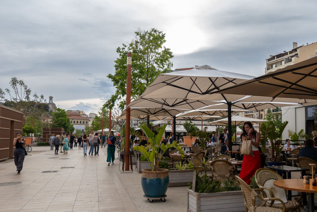 people eating outdoor which is one of the areas where you can walk on cannes from the cruise port