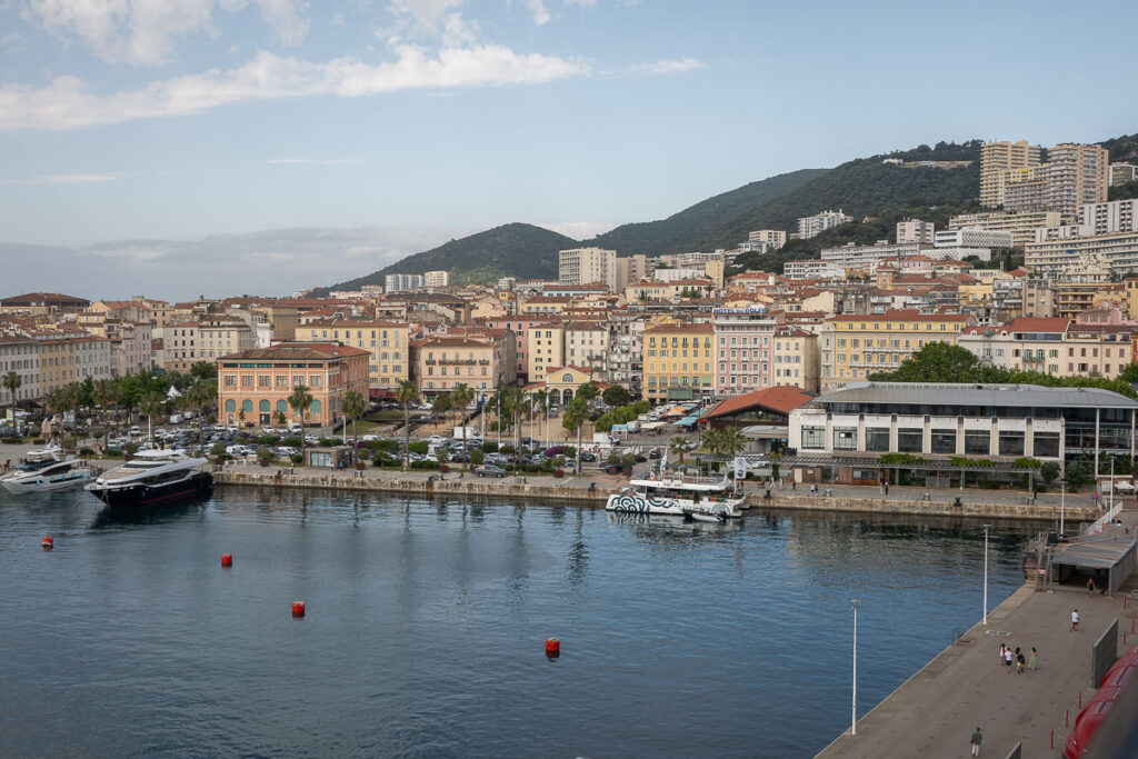 structures and mountains which is the Ajaccio cruise port view from the Virgin voyages cruise ship