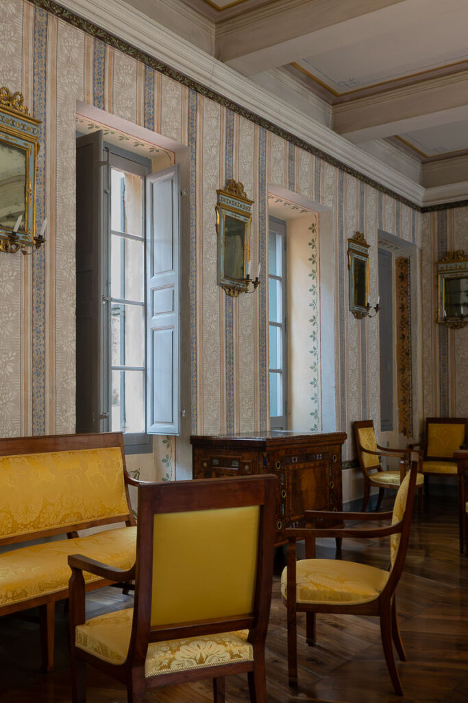 interior structure with antique chairs which is the Napoleon Bonaparte House Ajaccio