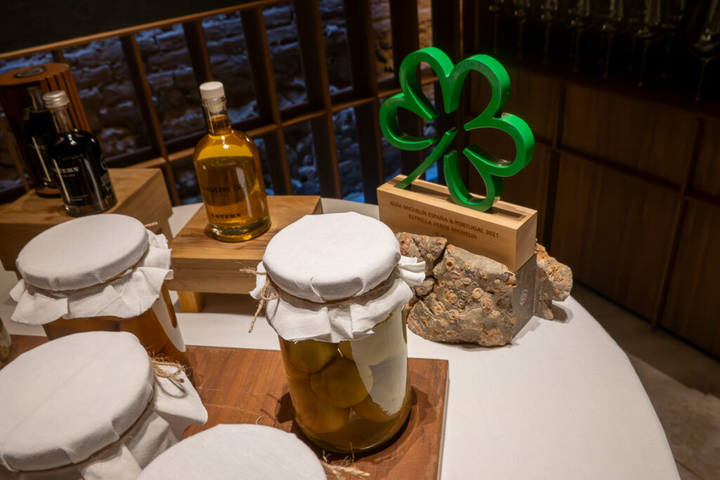Michelin green star sign and jar filled with vegetables which are the preserve of the Ricard Camarena