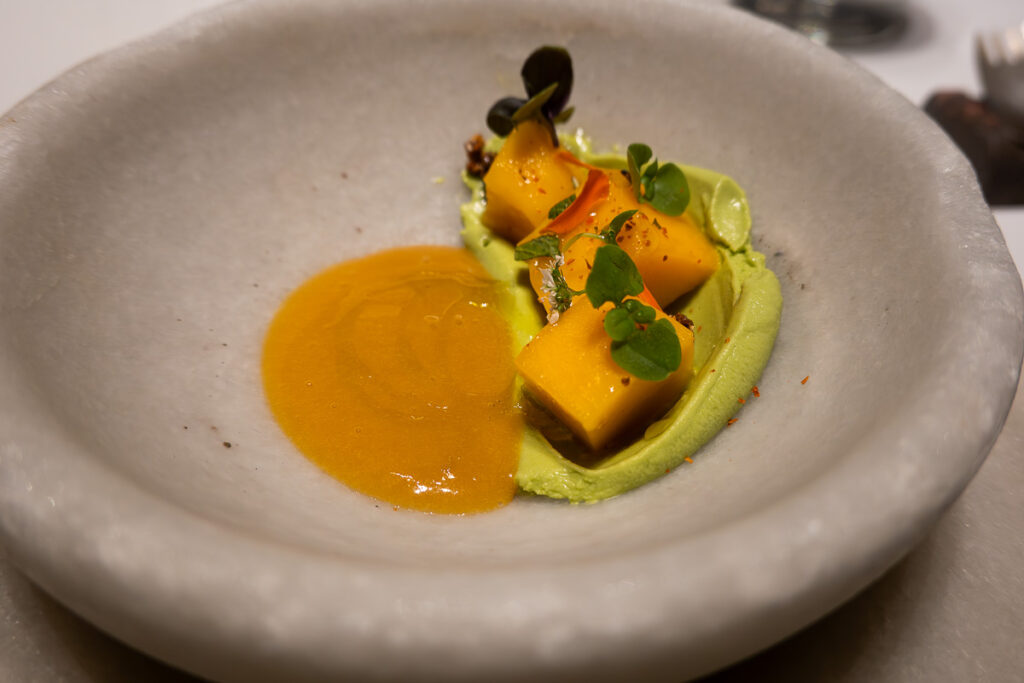 mango curry in a stone plate from Ricard Camarena Oxalis menu