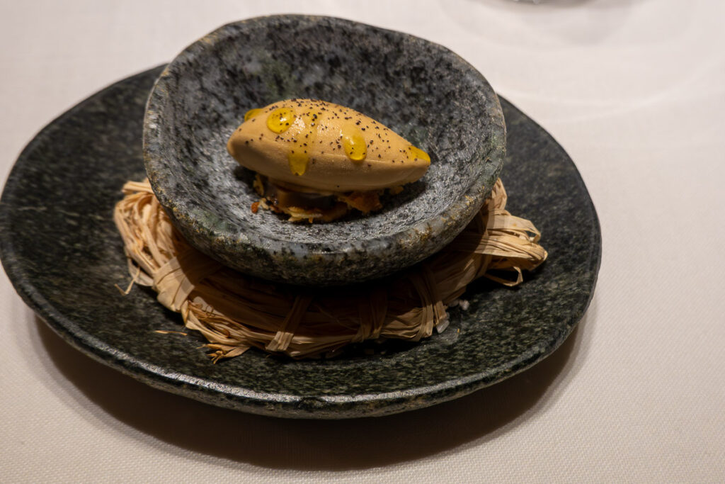 delicious fried eggplant with miso in a stone plate oxalis menu