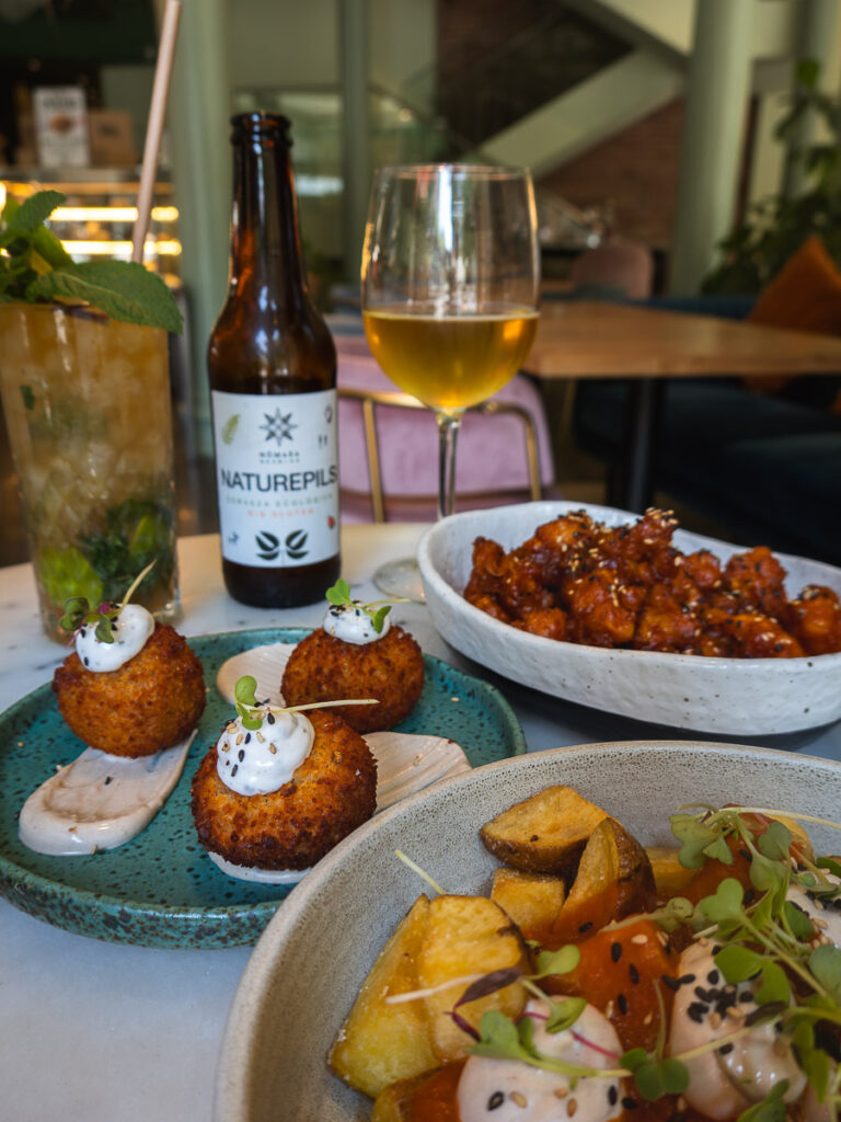vegan tapas from the best vegan restaurant barcelona and a gluten free beer barcelona