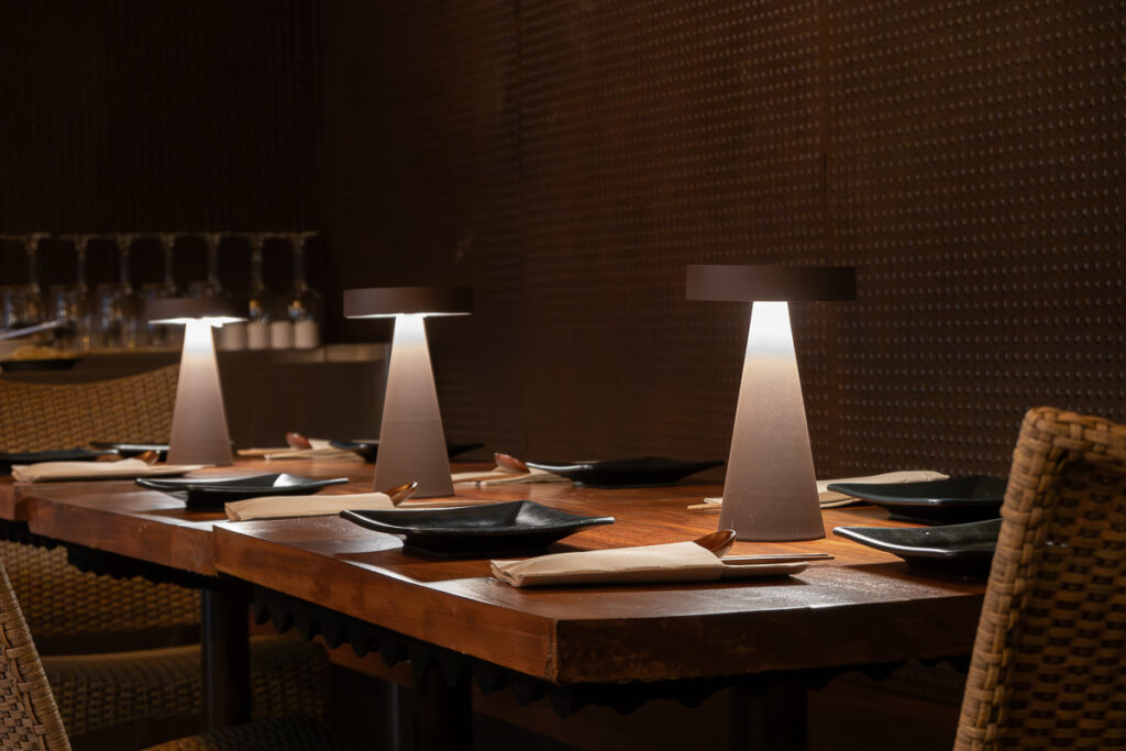 dim light in a restarant table from botanic plant based barcelona