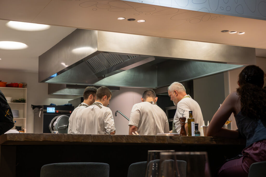 chef in the kitchen of restaurant xavier pellicer barcelona