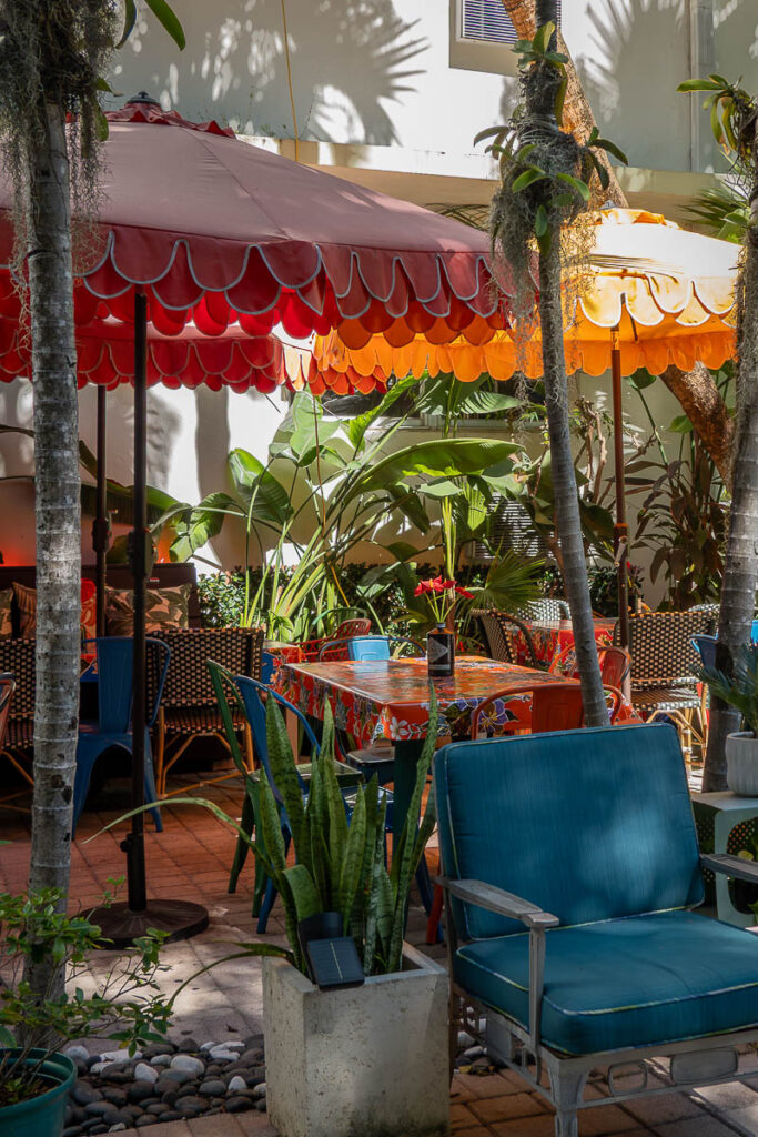 chairs and table which is the outdoor patio of moreno's cuba in miami
