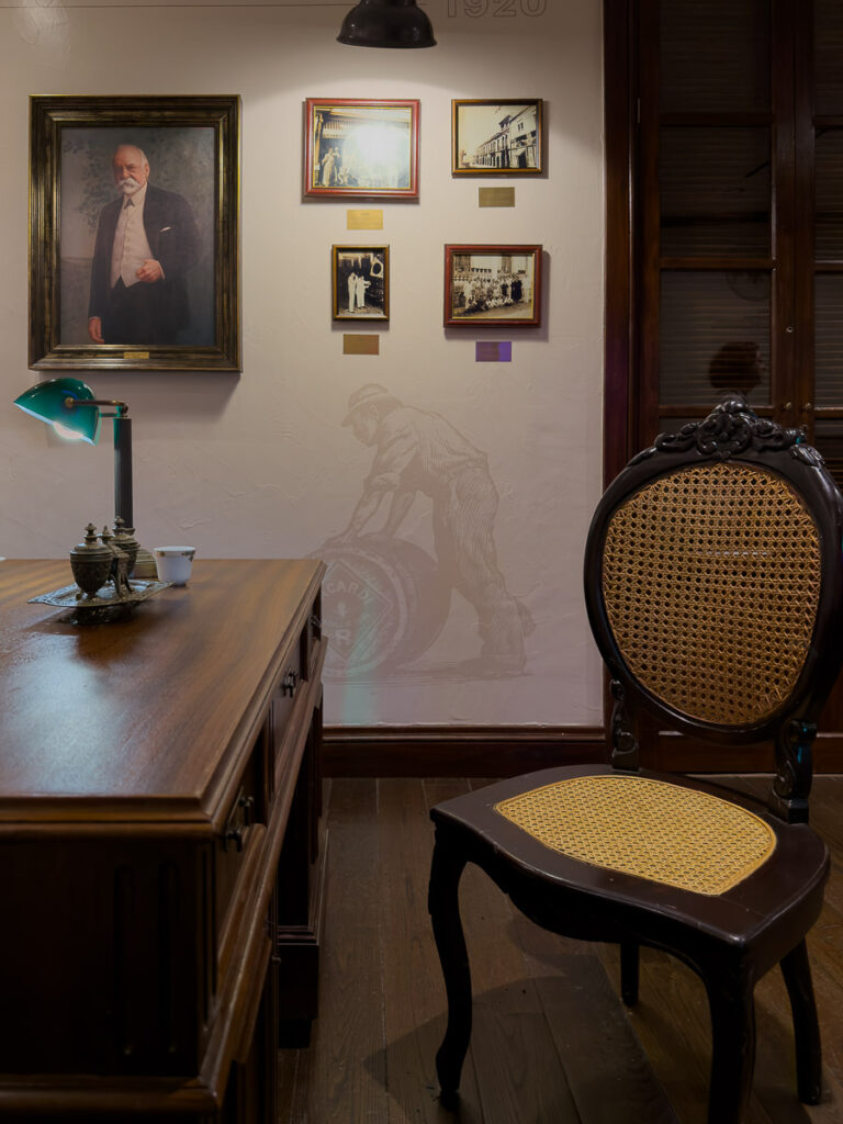 a chair and a desk which is the casa bacardi legacy tour museum review