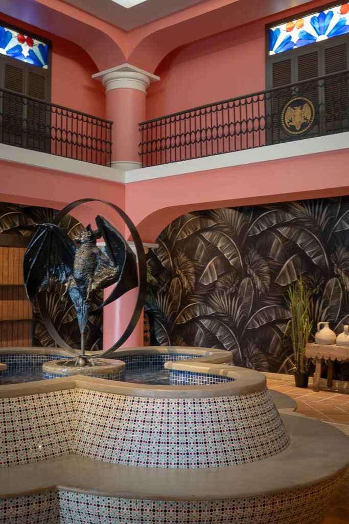 interior of a structure with an interior fountain and a metal sculpture which is the casa bacardi legacy tour review 