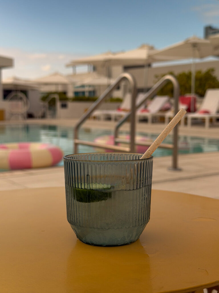 cocktail drink and rooftop pool at the hotel greystone miami beach