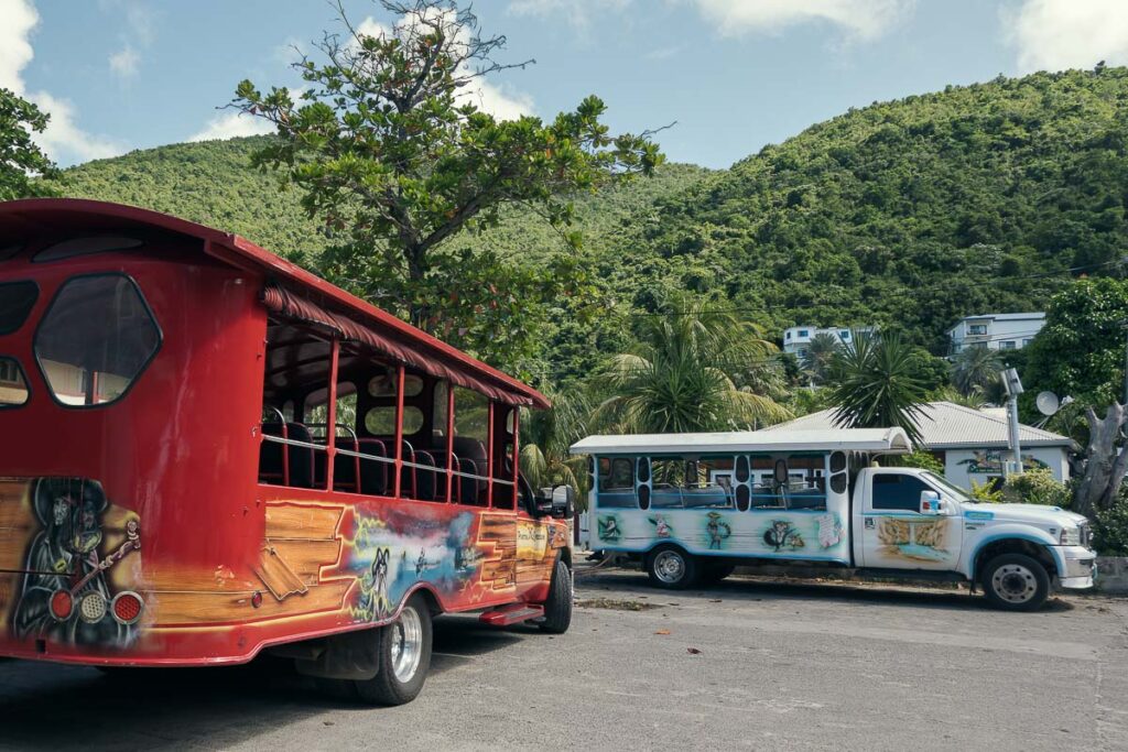 red and white bus which is the taxi from tortola cruise port to cane garden bay