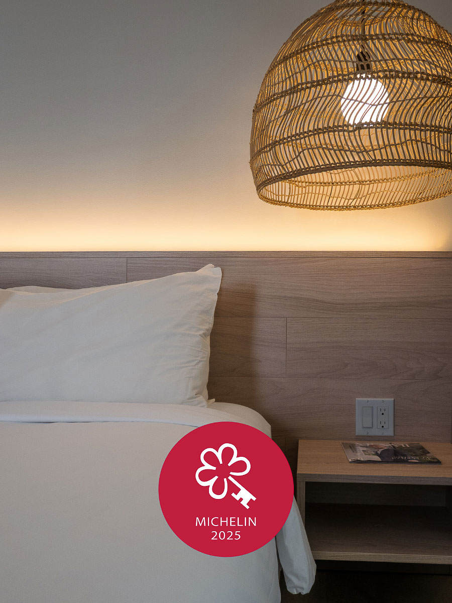 bed and lamp from Greystone Hotel which is where to stay in miami before a cruise