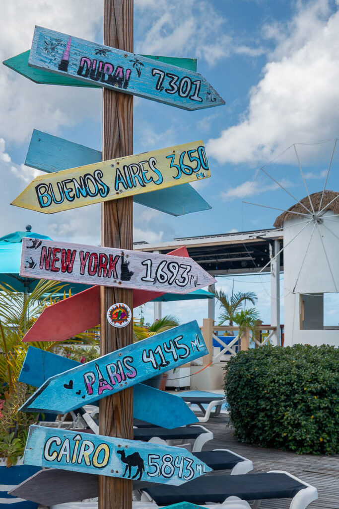 colorful street signs in st maarten beach bar and grill
