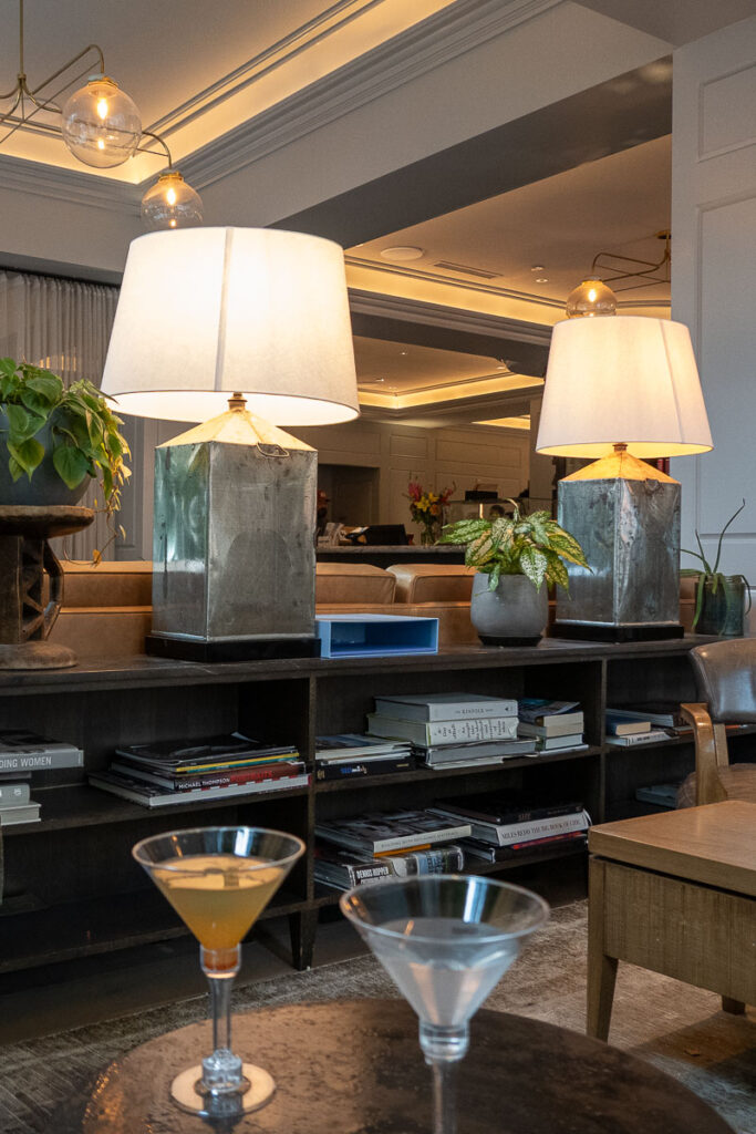 two martinis in the Woodlark hotel lobby which represents the amenities hotel review