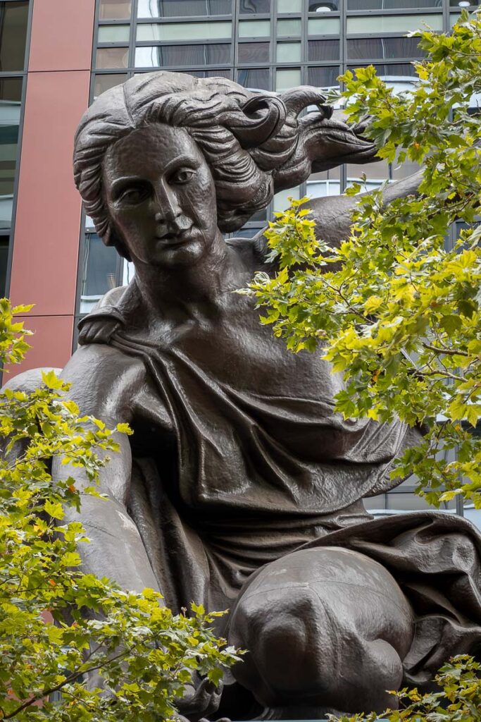 Portlandia Statue a Portland copper statue to visit which is one of the things to do in Portland