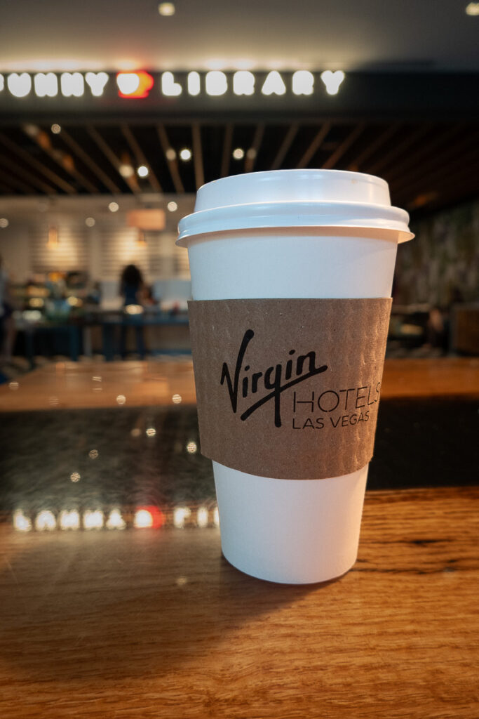 coffee in paper cup from Funny Library Virgin hotel las Vegas
