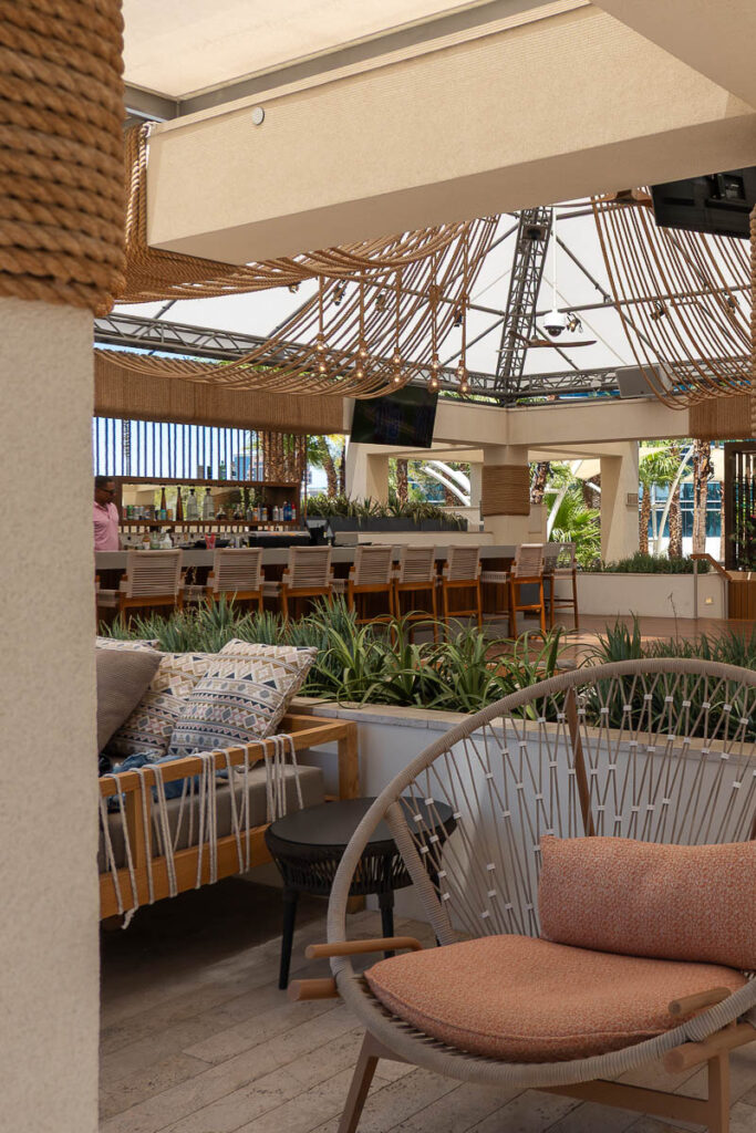 seating area of Virgin Hotel pool in Las Vegas for adults