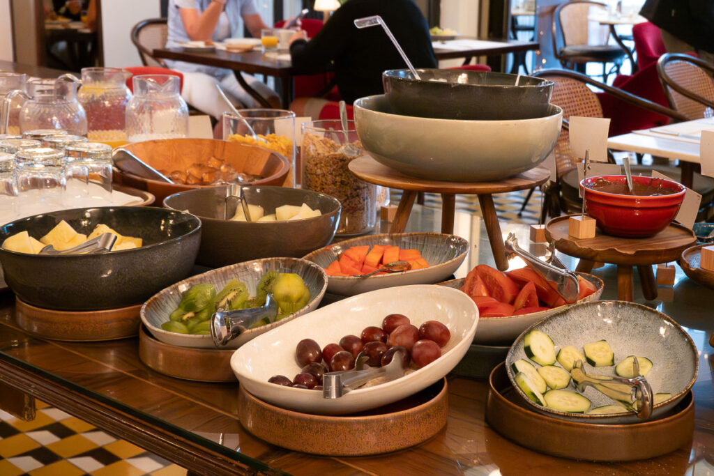 The cold breakfast station includes fruits and juices which represents the Brown's central hotel Lisbon