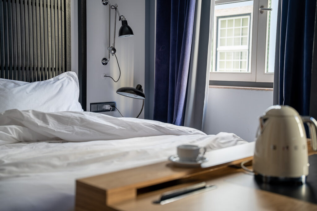 Superior room bed Lisbon Portugal Brown Central Hotel